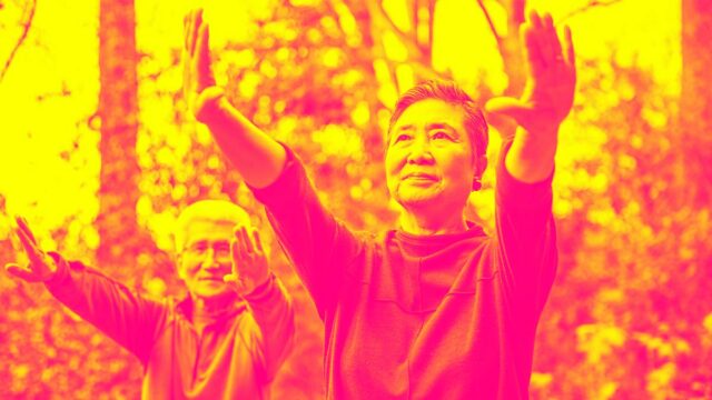 Senior couple doing Tai Chi outdoors depicting What is Alipay