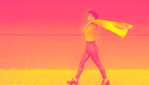 A woman struts, representing satisfaction with cutting her costs with Rapyd