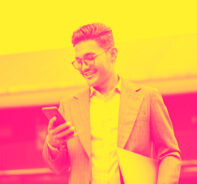 A businessman accepts payments using DANA eWallet