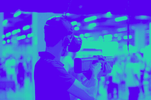 A man stands and shoots at a shooting range