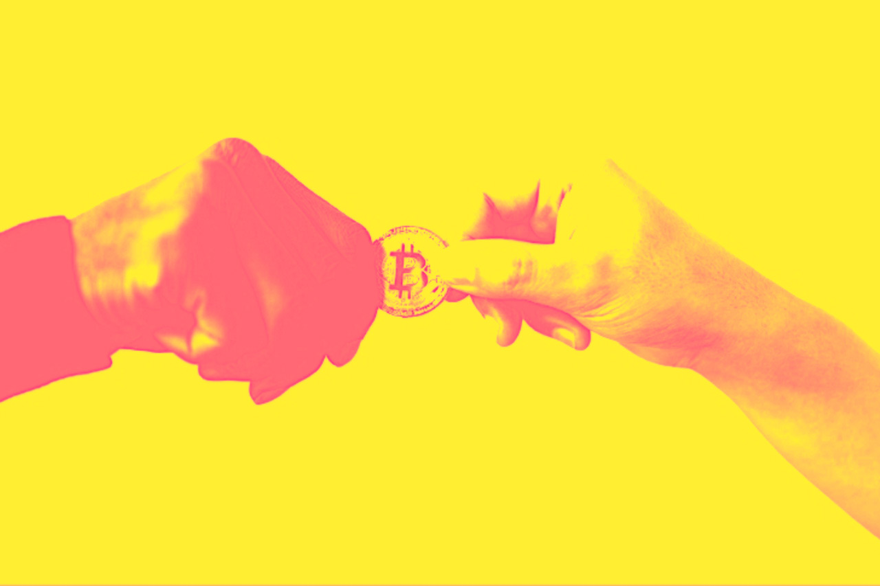 2 hands are trying to to take the stablecoin