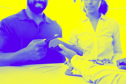 Couple making a payment using a payment processor