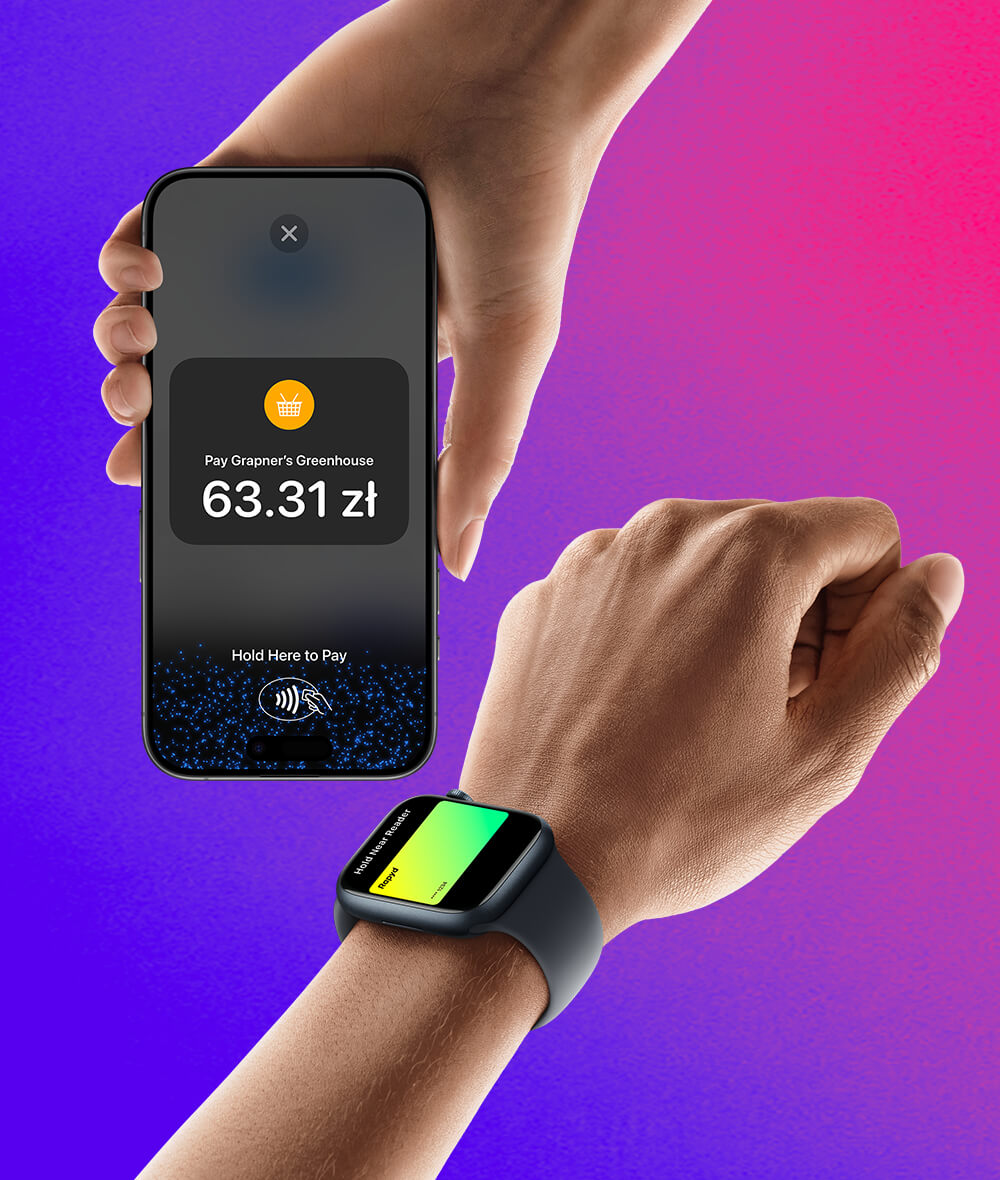 A hand wearing an Apple Watch with a Rapyd credit card about to pay on an iPhone that has a hold here to pay screen on it.